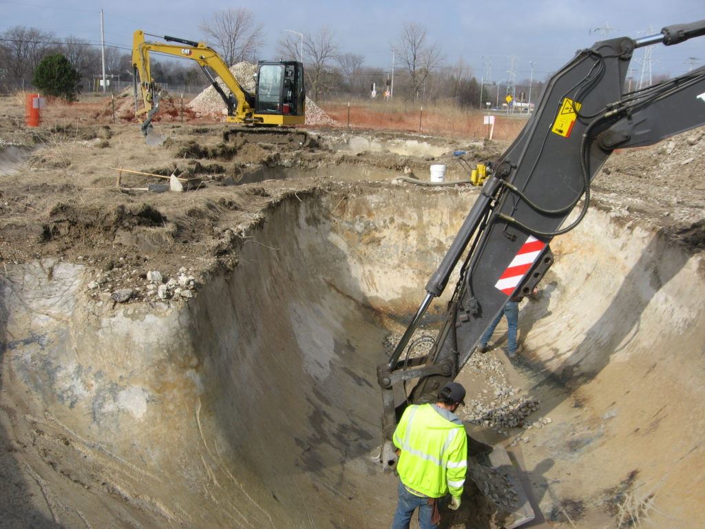 Digging out a bowl at the Turf site
